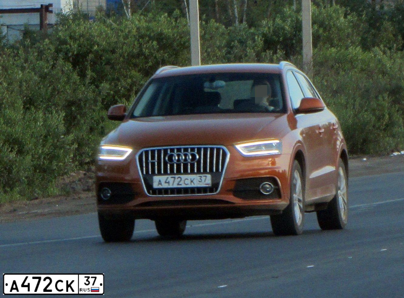 Фото автомобиля AUDI Q3, 2013 — госномер Н746ЕР10. Цвет: Оранжевый