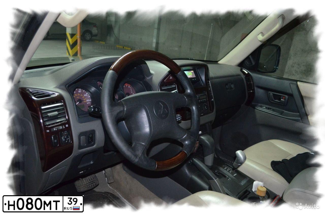 Фото автомобиля MITSUBISHI MONTERO, 2001 — госномер Н080МТ39. Цвет: БЕЖЕВЫЙ