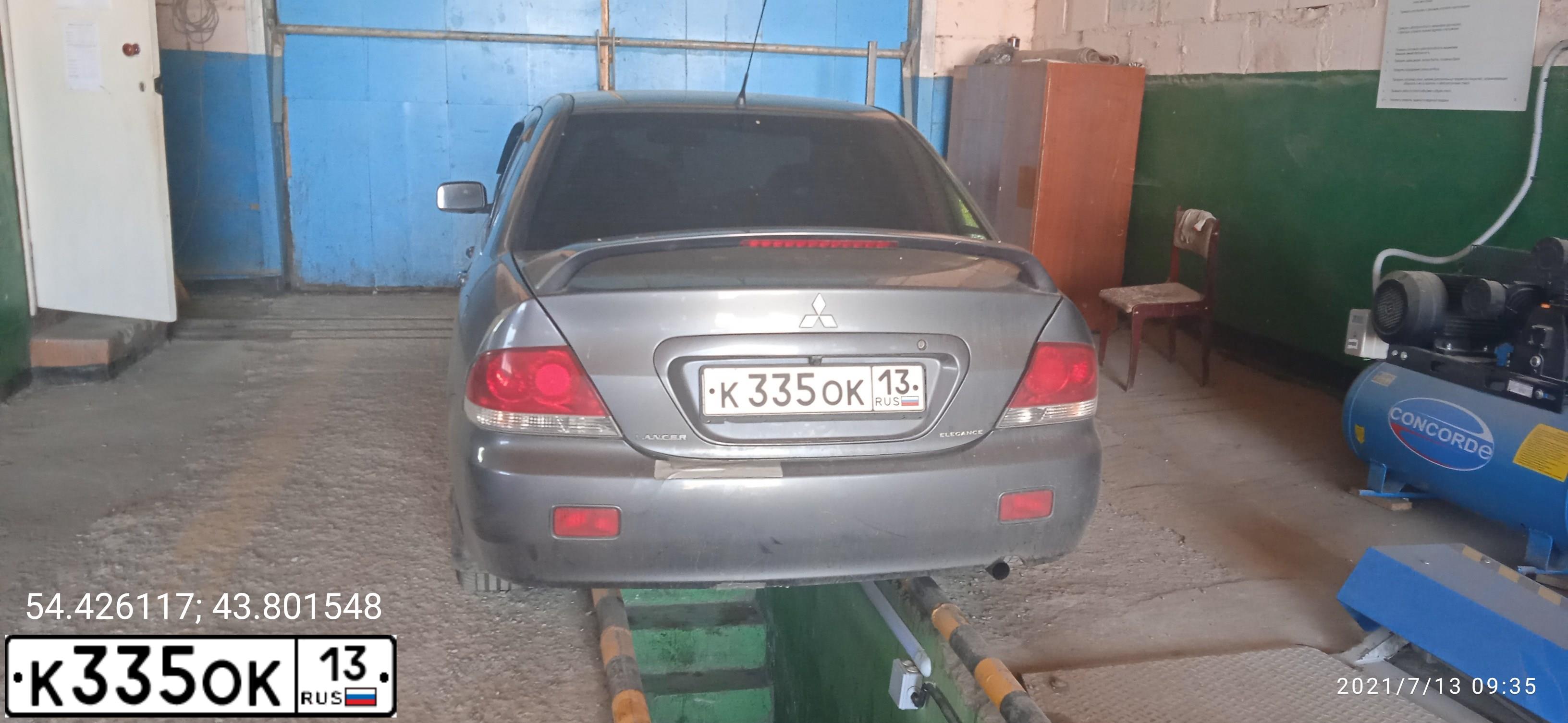 Фото автомобиля MITSUBISHI LANCER, 2006 — госномер К335ОК13. Цвет: СЕРЫЙ