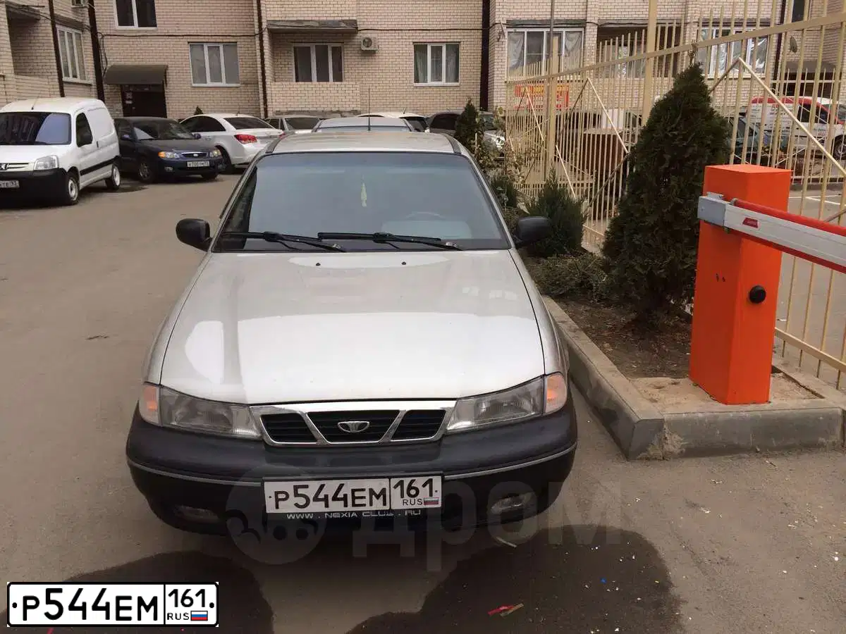 Фото автомобиля DAEWOO NEXIA, 2006 — госномер Р544ЕМ161. Цвет: БЕЛЫЙ