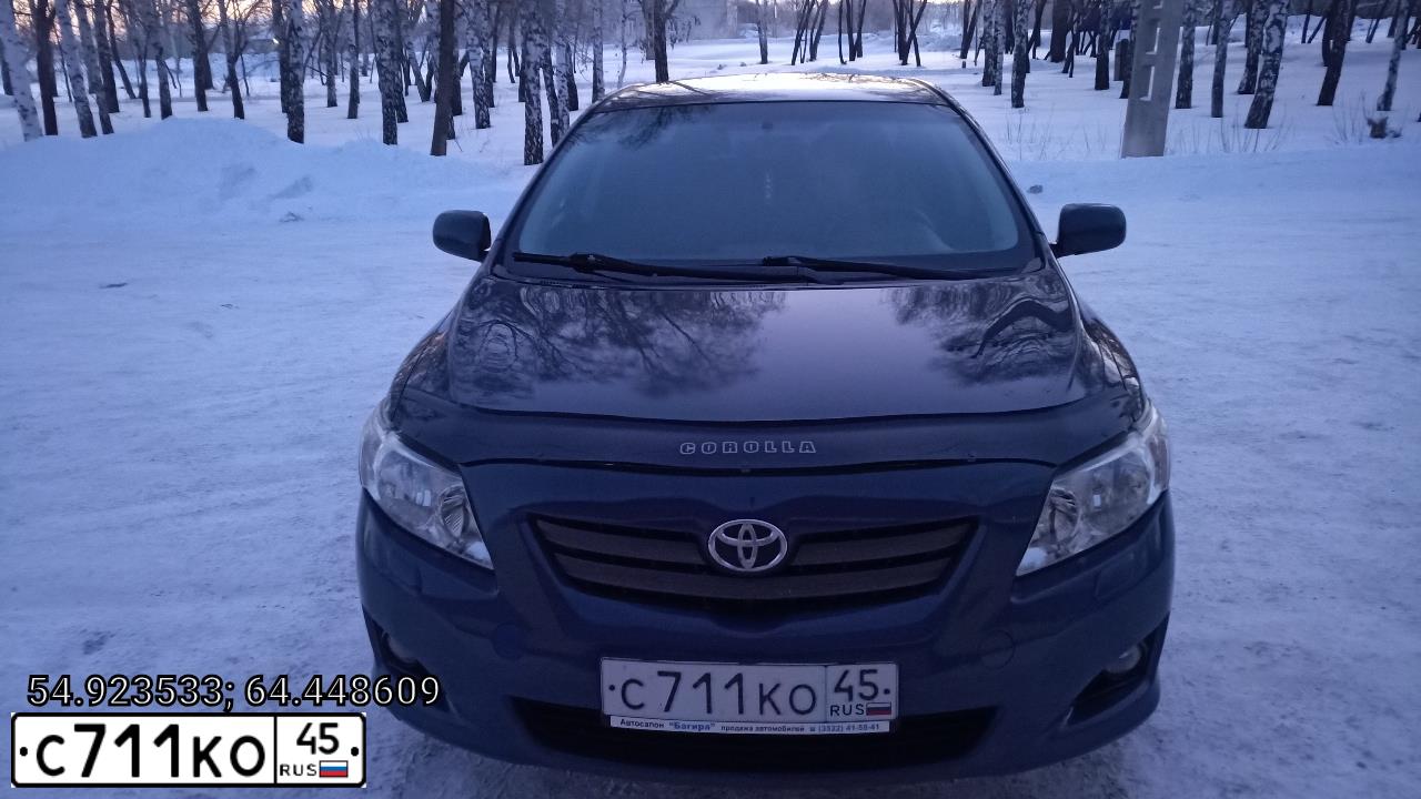 Фото автомобиля TOYOTA COROLLA, 2008 — госномер М082КК186. Цвет: СЕРО-СИНИЙ