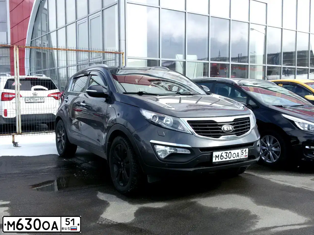 Фото автомобиля KIA SPORTAGE, 2013 — госномер М630ОА51. Цвет: СЕРЫЙ