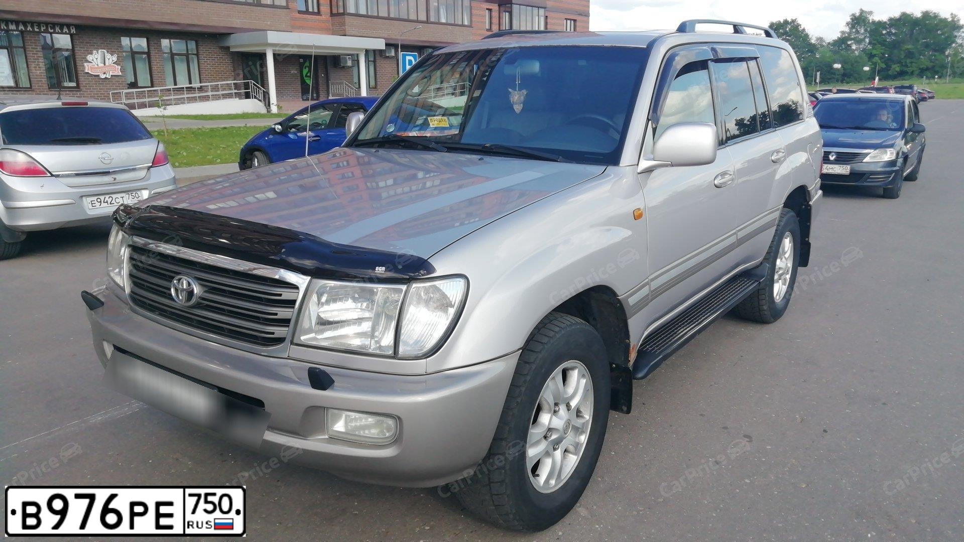 Фото автомобиля TOYOTA LANDCRUISER, 2004 — госномер В976РЕ750. Цвет: СЕРЕБРИСТЫЙ