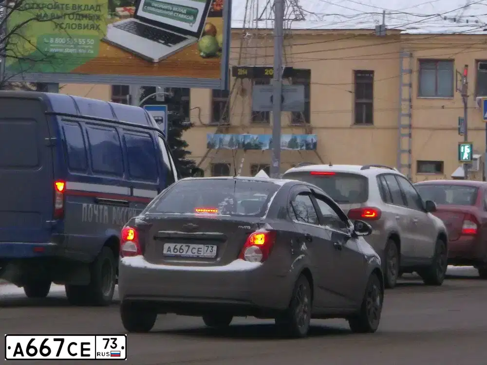 Фото автомобиля CHEVROLET AVEO, 2012 — госномер А667СЕ73. Цвет: ЧЕРНЫЙ