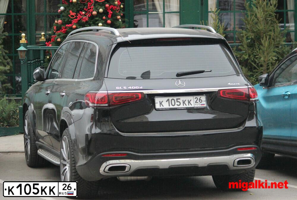 Фото автомобиля FORD FOCUS, 2012 — госномер К105КК26. Цвет: БЕЛЫЙ