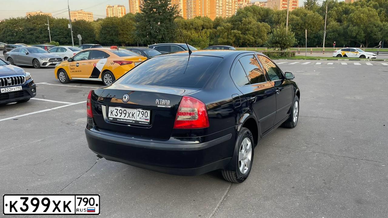 Фото автомобиля SKODA OCTAVIA, 2008 — госномер Н594АТ977. Цвет: ЧЕРНЫЙ