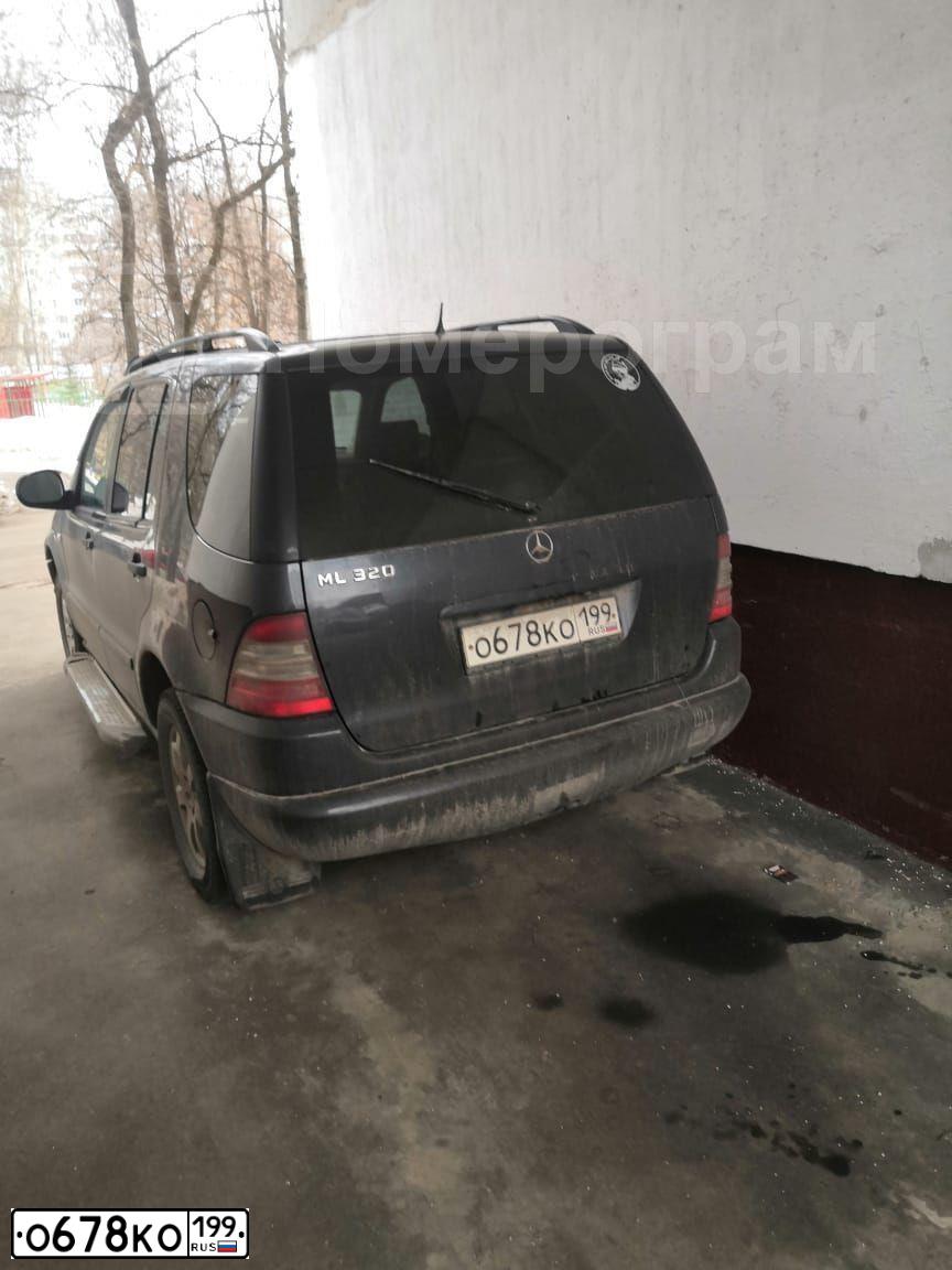 Фото автомобиля MITSUBISHI PAJERO, 1993 — госномер Т006КУ750. Цвет: ЧЕРНЫЙ