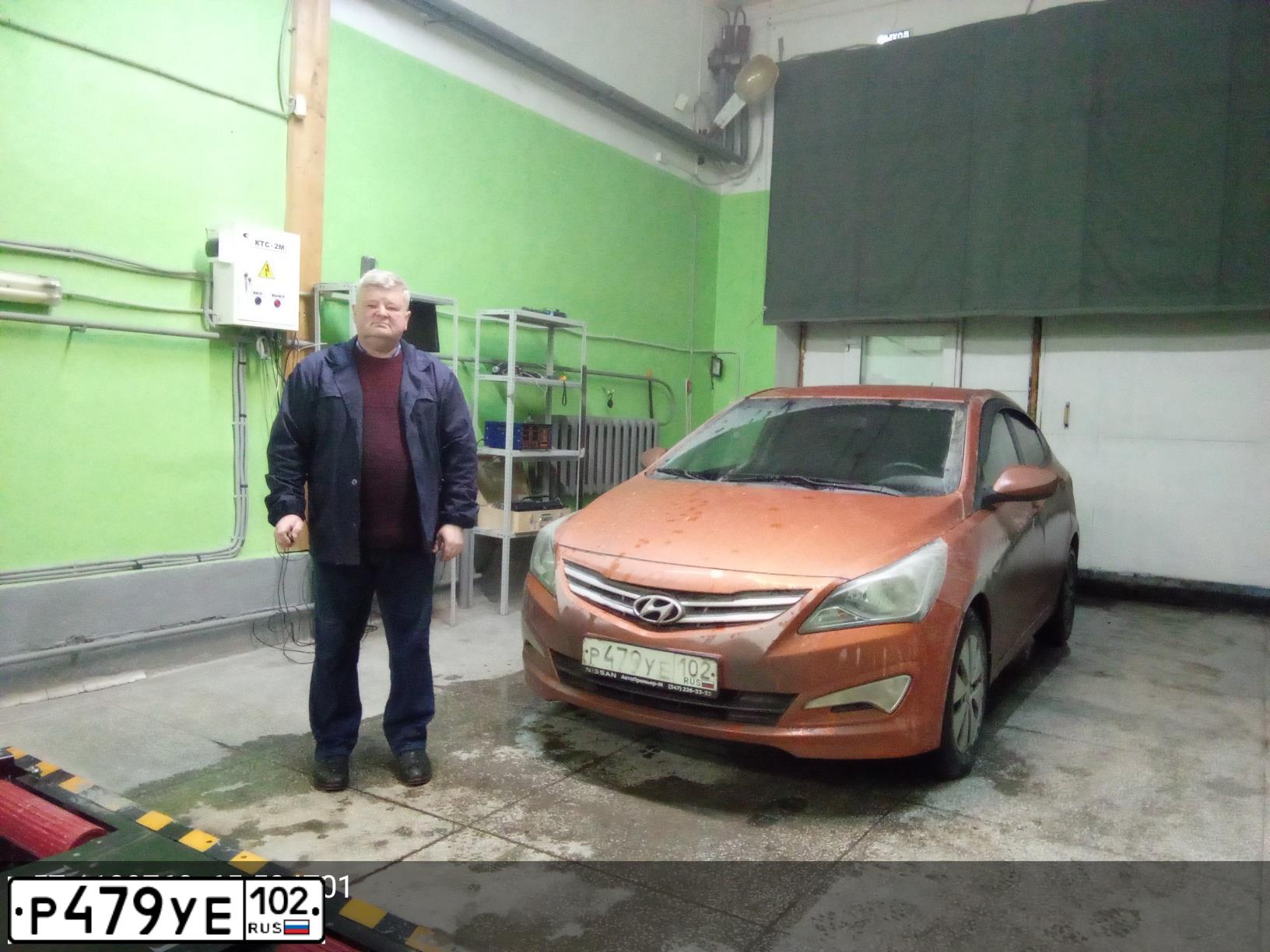 Фото автомобиля HYUNDAI SOLARIS, 2014 — госномер Х031МЕ72. Цвет: Оранжевый