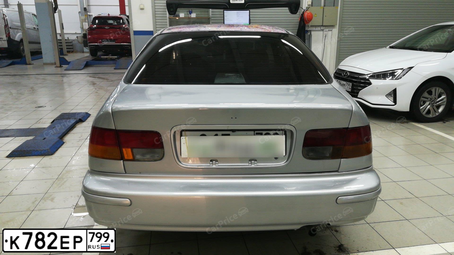 Фото автомобиля HONDA CIVIC, 1998 — госномер О015РМ799. Цвет: СЕРЕБРИСТЫЙ