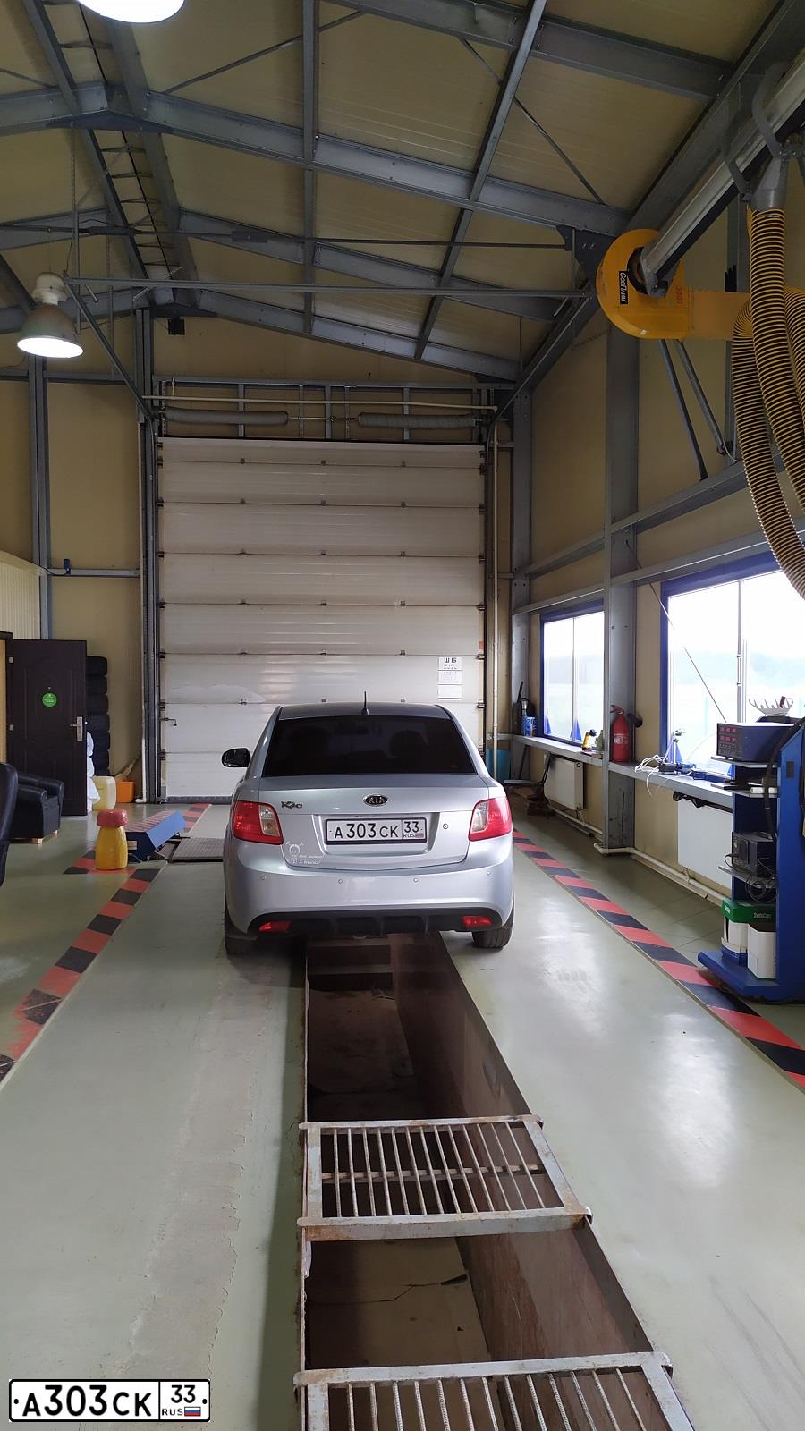 Фото автомобиля KIA RIO, 2009 — госномер А303СК33. Цвет: СЕРЕБРИСТЫЙ