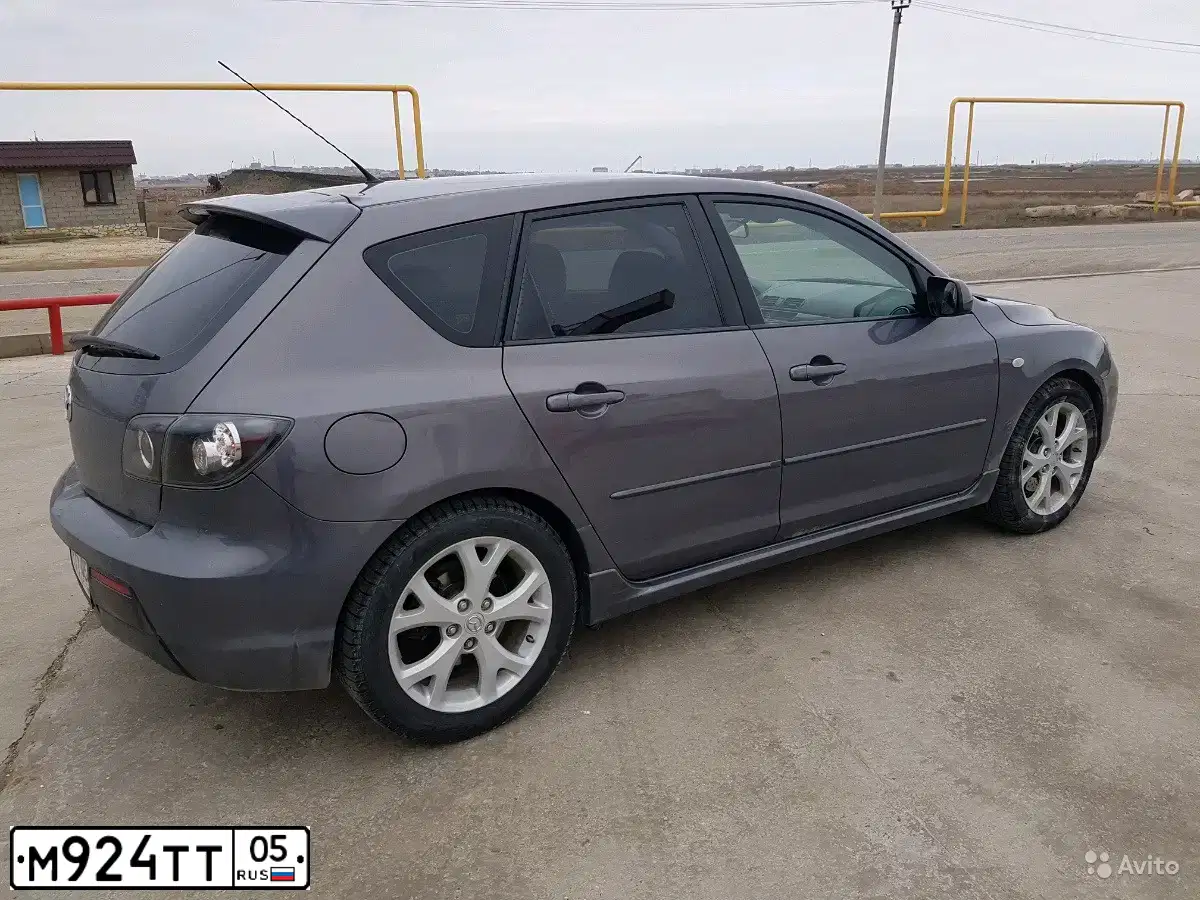 Фото автомобиля MAZDA 3, 2007 — госномер Е439НВ82. Цвет: СЕРЫЙ