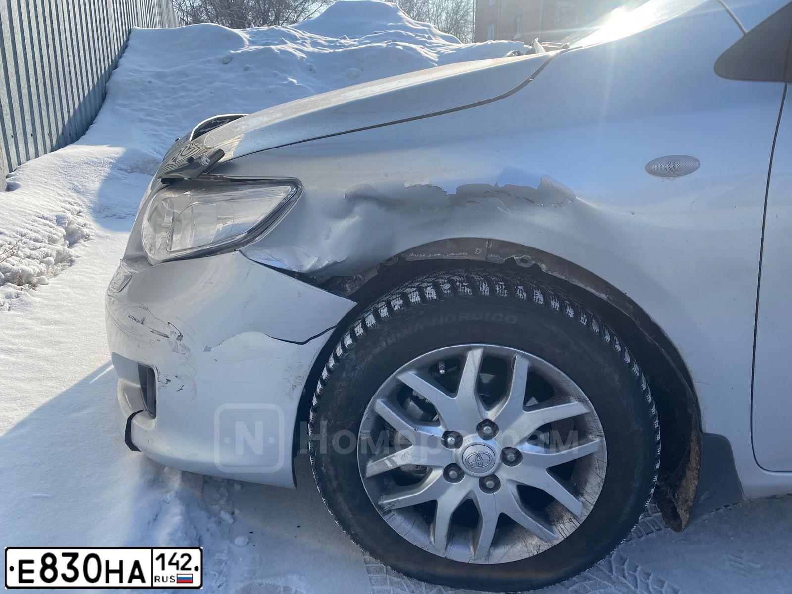 Фото автомобиля TOYOTA COROLLA, 2007 — госномер О065НН36. Цвет: Серебристый