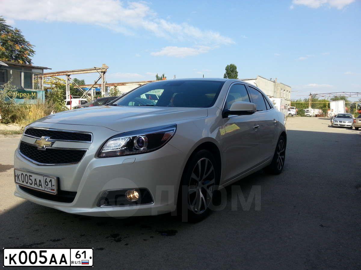 Фото автомобиля TOYOTA COROLLA, 2005 — госномер К005АА61. Цвет: Серебристый