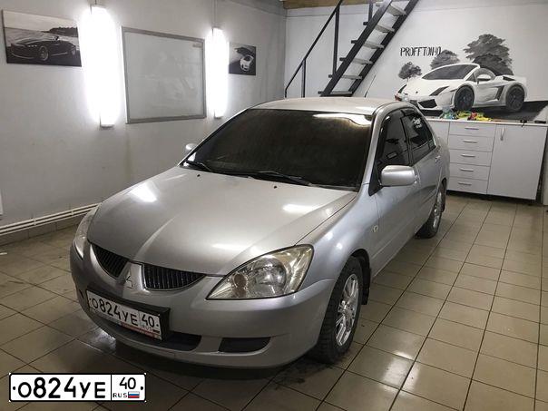 Фото автомобиля MITSUBISHI LANCER, 2004 — госномер К420РТ97. Цвет: СЕРЫЙ МЕТАЛЛИК