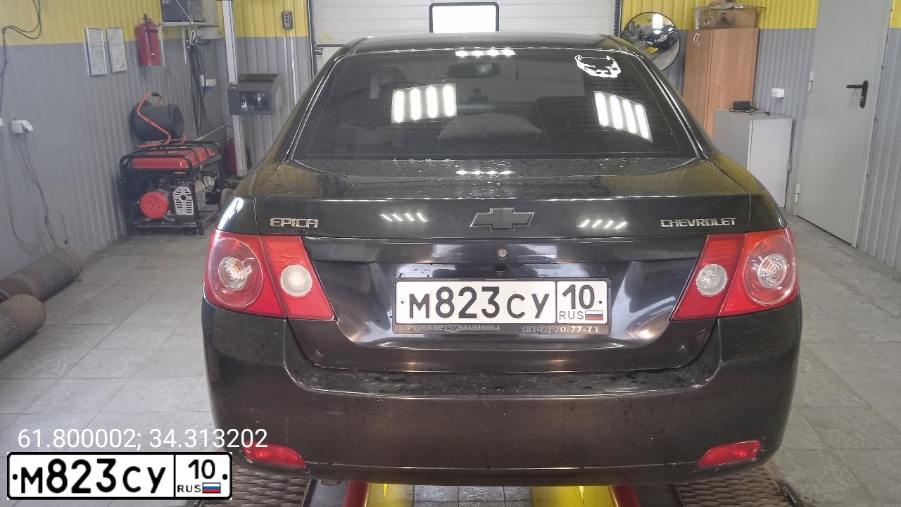 Фото автомобиля CHEVROLET EPICA, 2008 — госномер М823СУ10. Цвет: ЧЕРНЫЙ