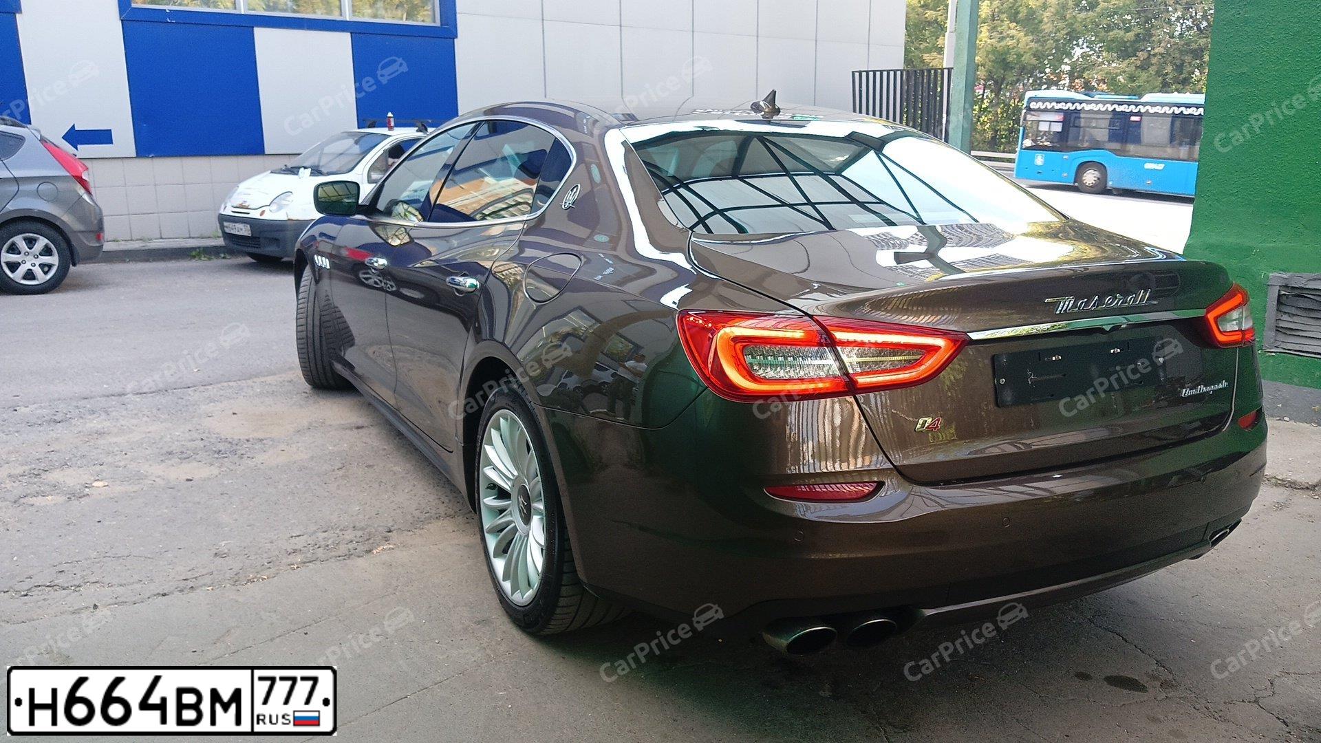 Фото автомобиля MASERATI QUATTROPORTE, 2014 — госномер Р242НК136. Цвет: КОРИЧНЕВЫЙ