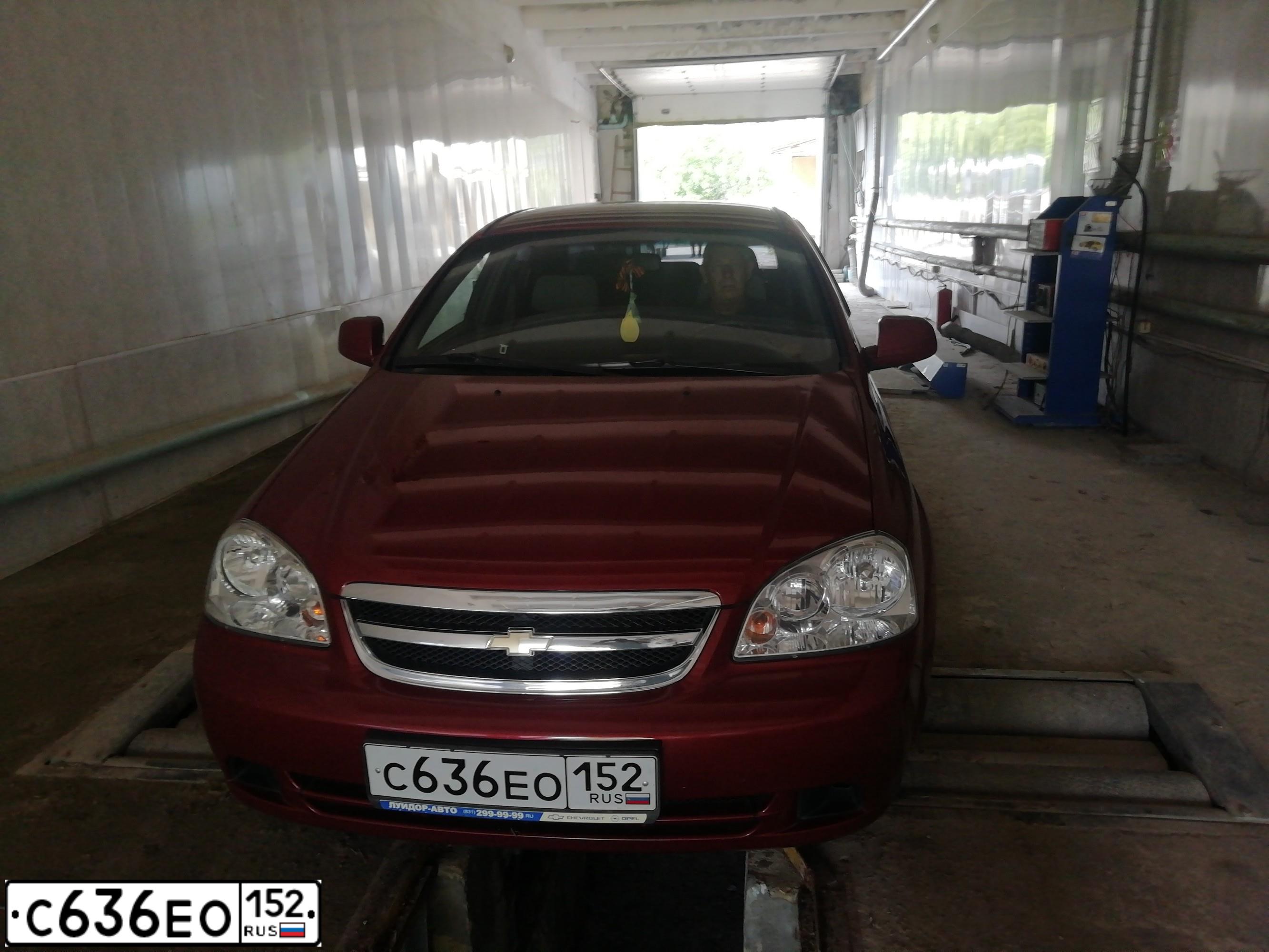 Фото автомобиля CHEVROLET LACETTI, 2012 — госномер С636ЕО152. Цвет: Красный