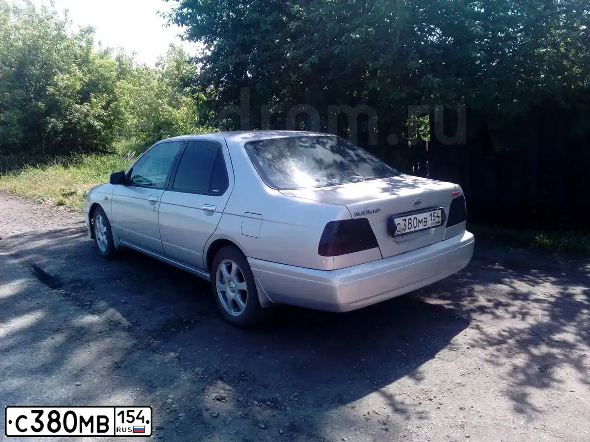 Фото автомобиля NISSAN BLUEBIRD, 1997 — госномер С380МВ154. Цвет: Светло Серый
