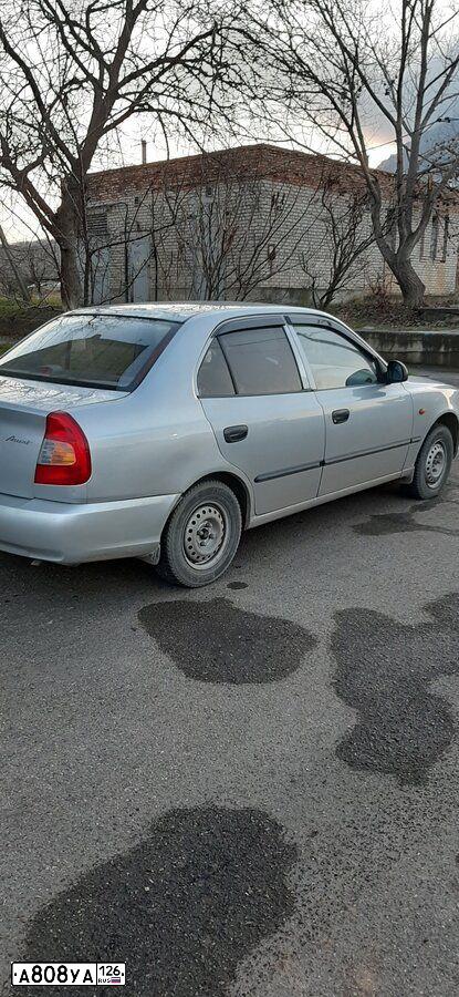 Фото автомобиля LADA 2190 GRANTA, 2018 — госномер Р646ТР05. Цвет: Белый