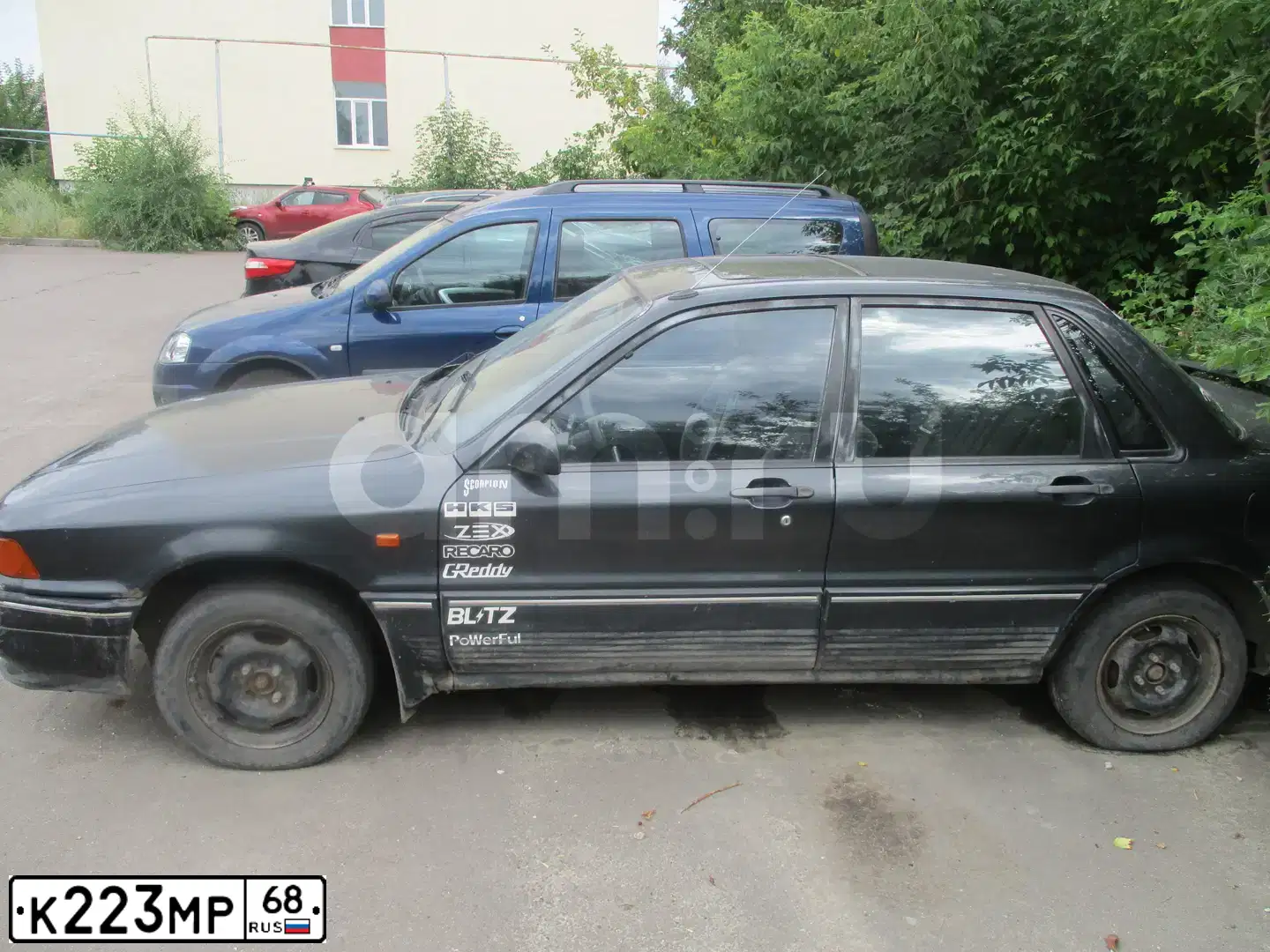 Фото автомобиля MITSUBISHI GALANT, 1990 — госномер К223МР68. Цвет: ЧЕРНЫЙ