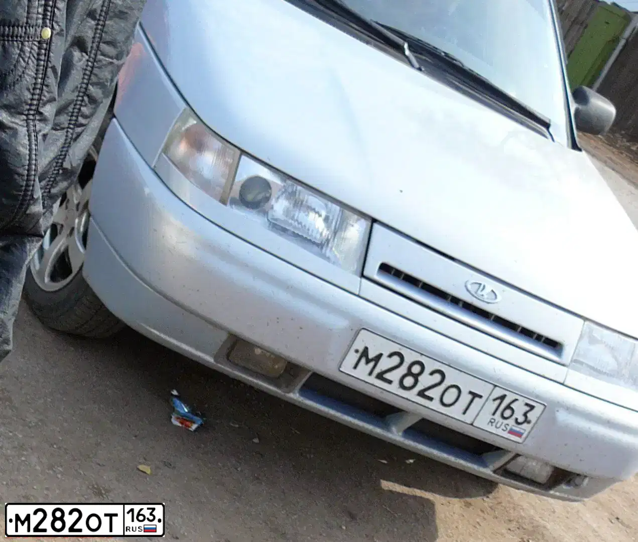 Фото автомобиля LADA 2110, 2005 — госномер Т166НН163. Цвет: Серебристо-Желто-Голубой
