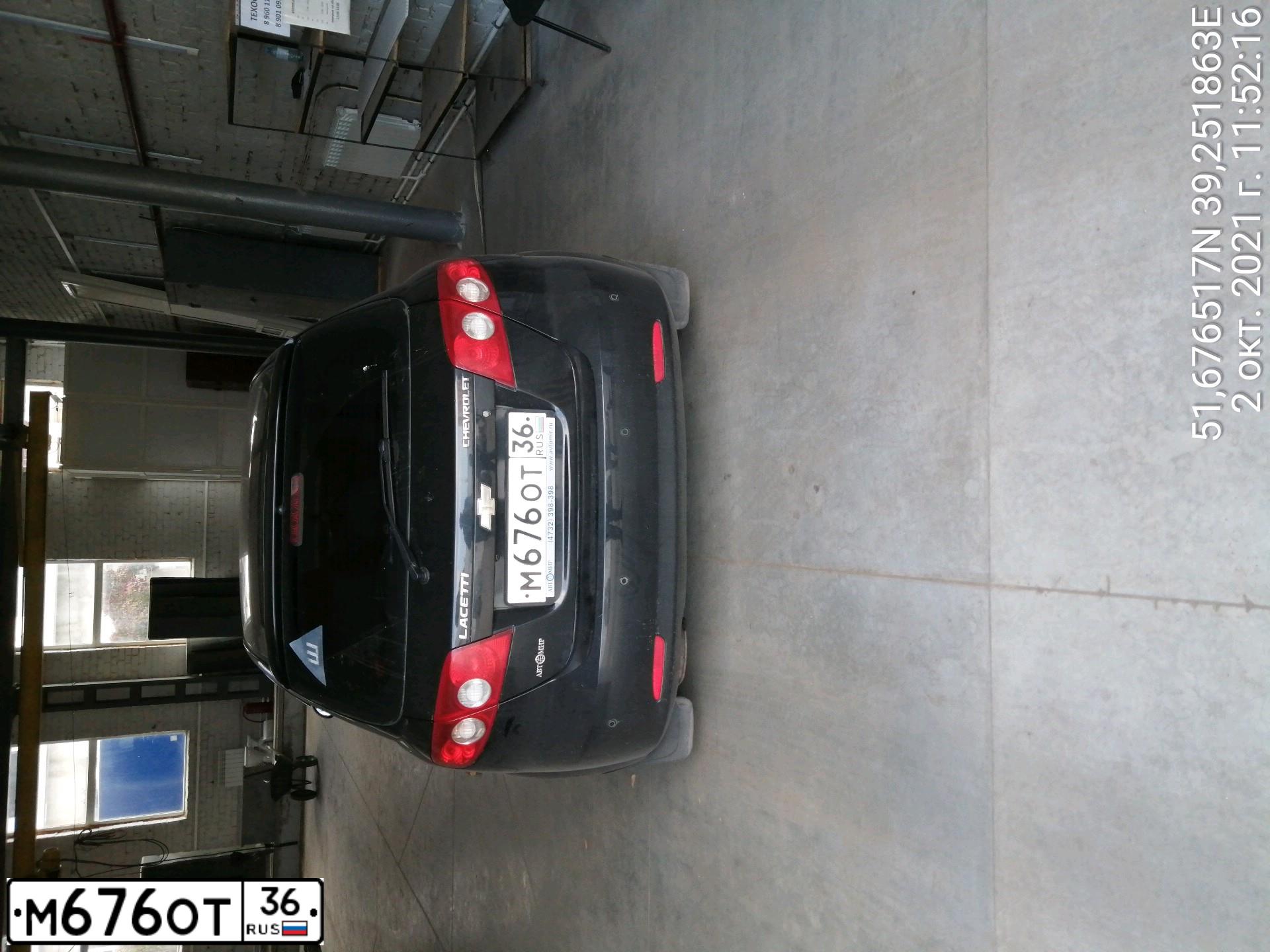 Фото автомобиля CHEVROLET LACETTI, 2008 — госномер М676ОТ36. Цвет: ЧЕРНЫЙ