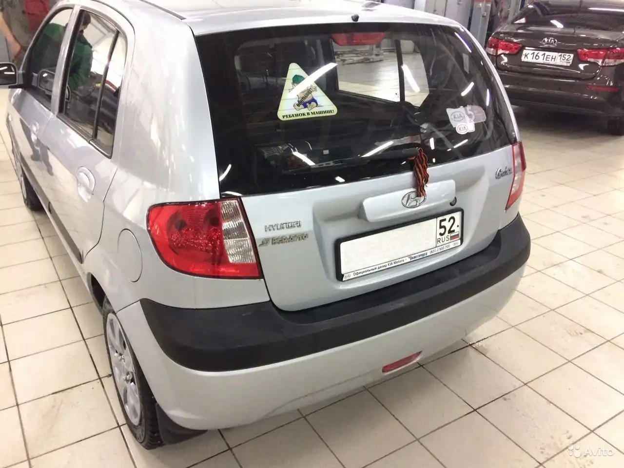 Фото автомобиля LADA 2190 GRANTA, 2012 — госномер М950ХУ152. Цвет: ЧЕРНЫЙ