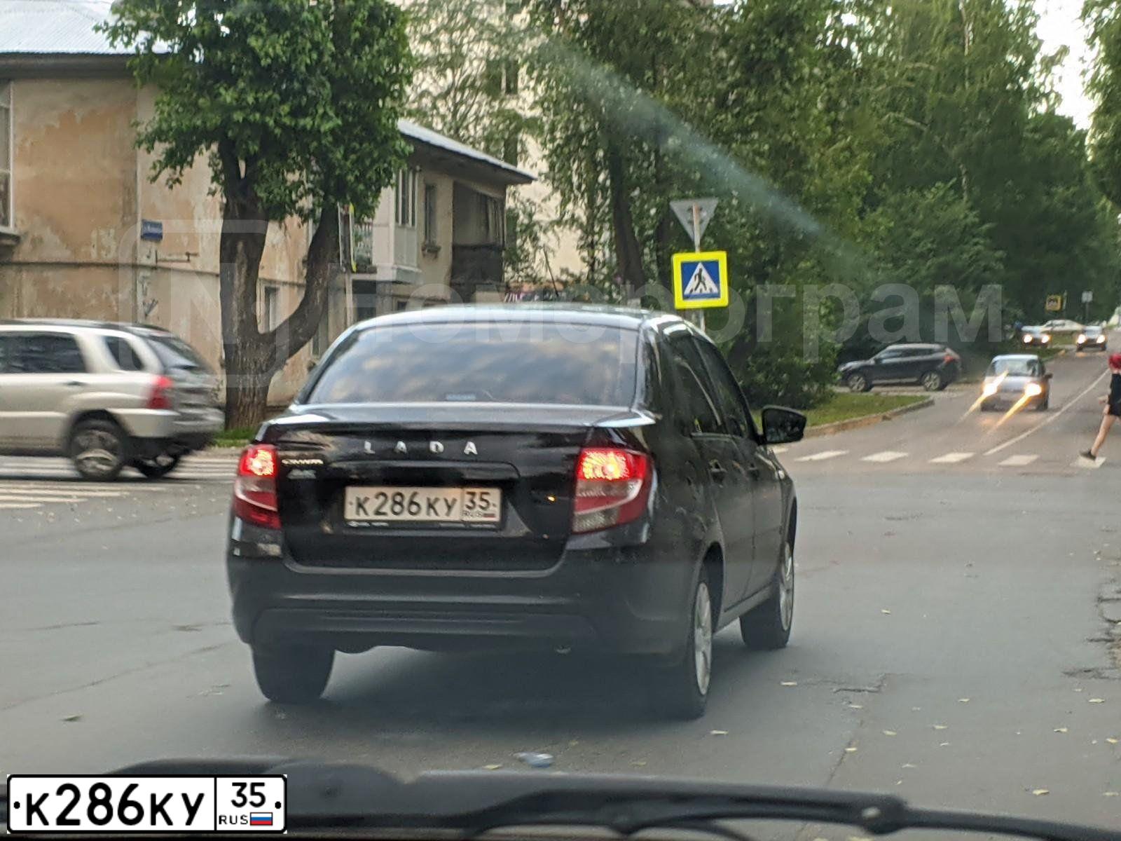 Фото автомобиля LADA 2190 GRANTA, 2019 — госномер К286КУ35. Цвет: ЧЕРНЫЙ