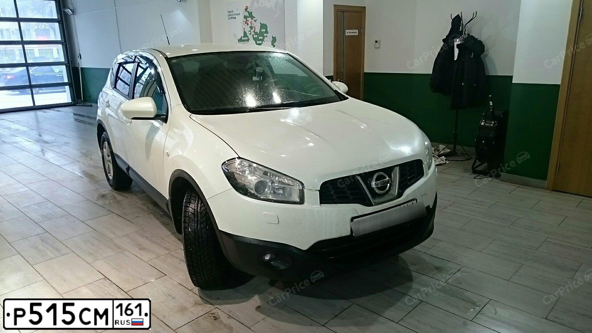 Фото автомобиля NISSAN QASHQAI, 2013 — госномер Р515СМ161. Цвет: Белый