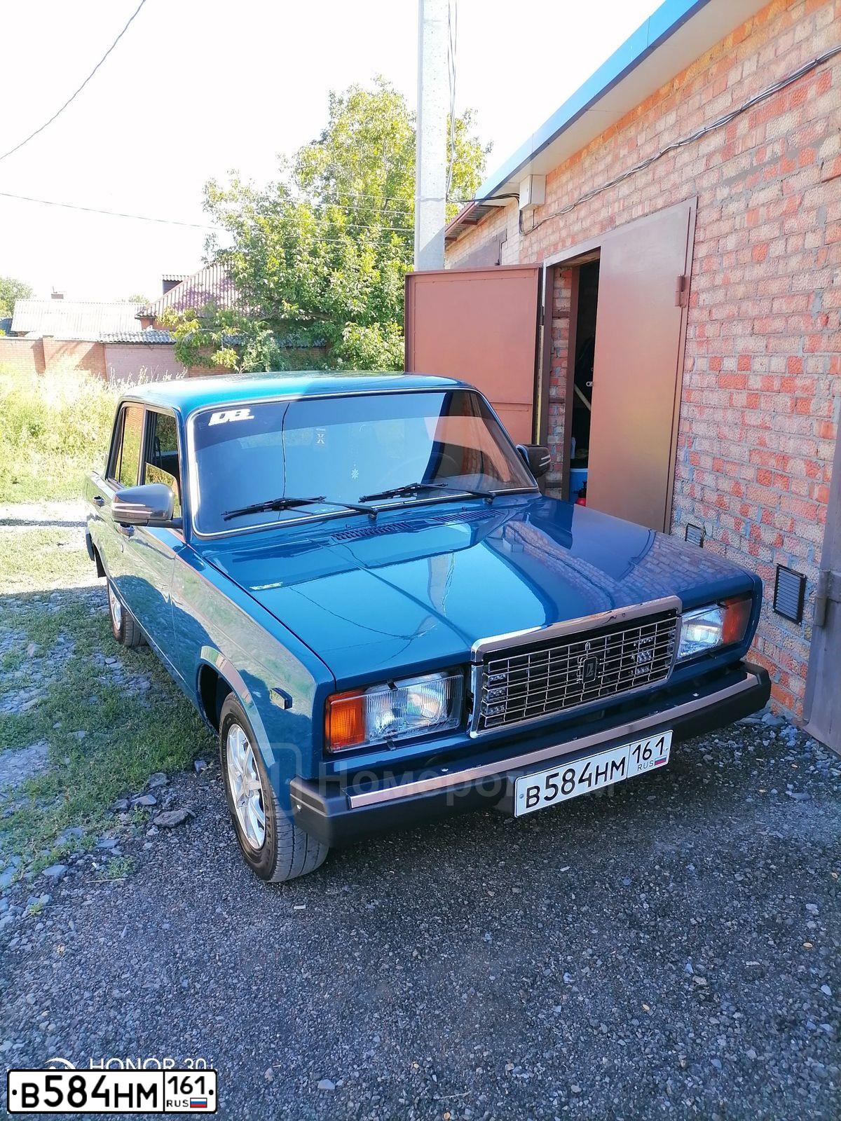 Фото автомобиля LADA 2107, 2008 — госномер В584НМ161. Цвет: Сине-зеленый