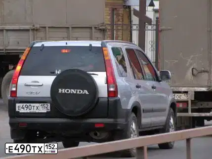 Фото автомобиля HONDA CR-V, 2003 — госномер Е490ТХ152. Цвет: СВЕТЛО-СЕРЫЙ