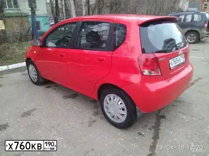 Фото автомобиля CHEVROLET AVEO, 2006 — госномер В654ОС177. Цвет: Красный