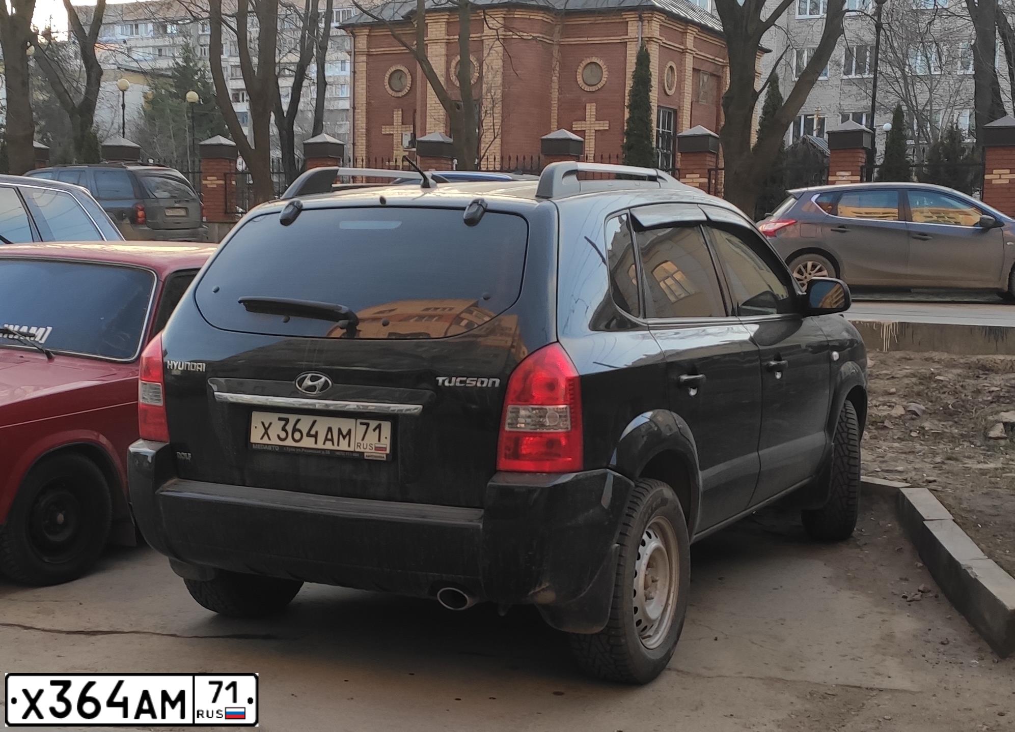 Фото автомобиля HYUNDAI TUCSON, 2008 — госномер Х364АМ71. Цвет: ЧЕРНЫЙ