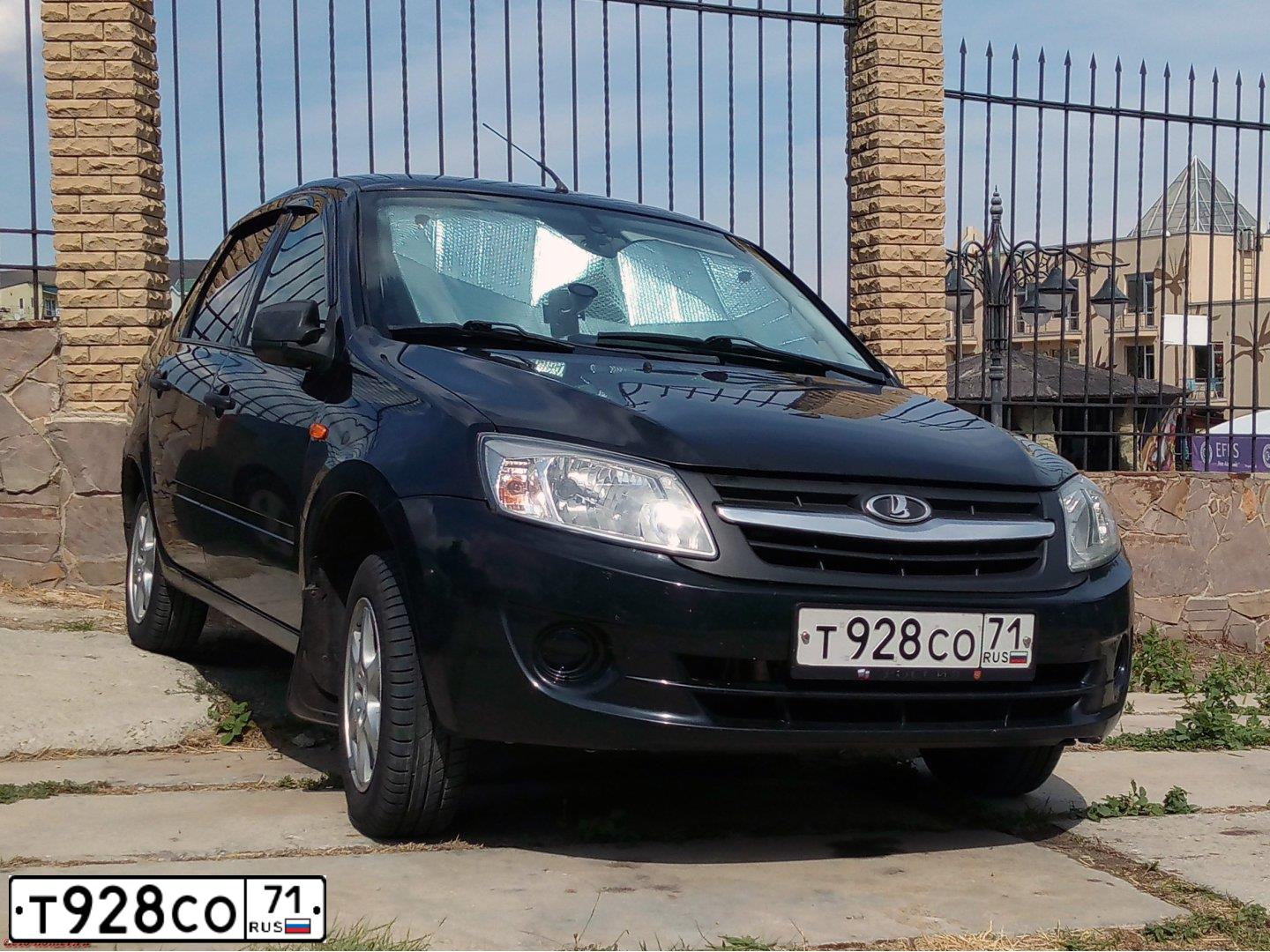 Фото автомобиля LADA 2190 GRANTA, 2012 — госномер Т928СО71. Цвет: Сине-Черный