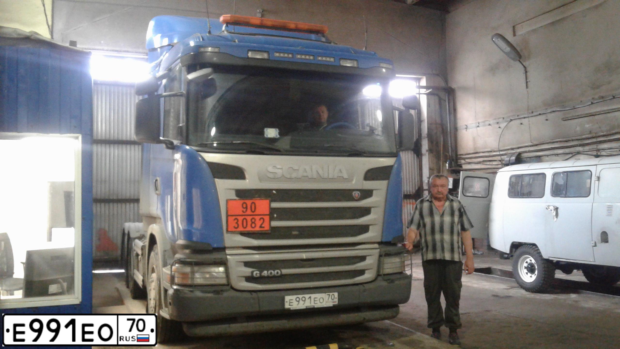 Фото автомобиля SCANIA SERIE G /6X4/, 2017 — госномер Е991ЕО70. Цвет: синий