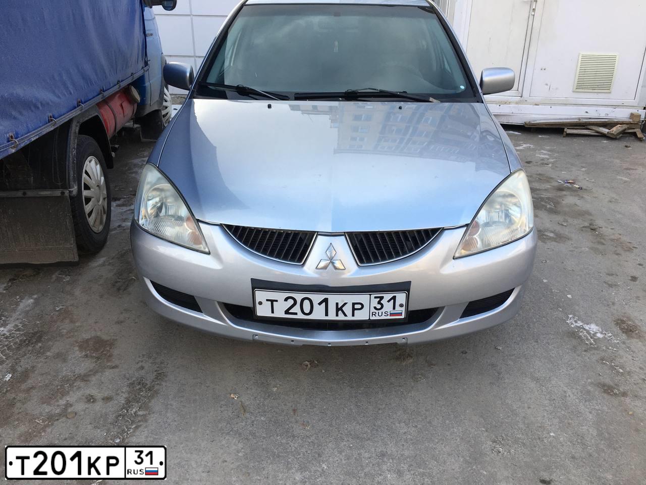 Фото автомобиля MITSUBISHI LANCER, 2005 — госномер К010СА31. Цвет: Серебристый