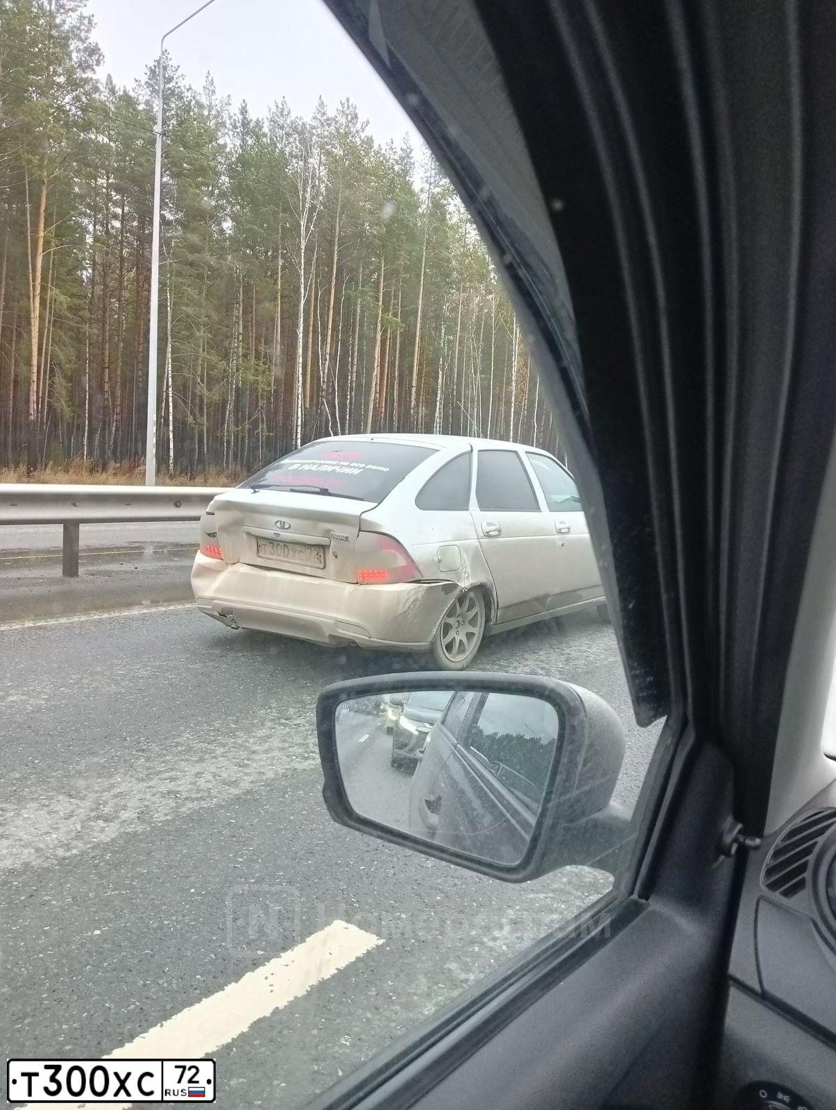 Фото автомобиля MITSUBISHI LANCER, 2013 — госномер Т300ХС72. Цвет: ЧЕРНЫЙ