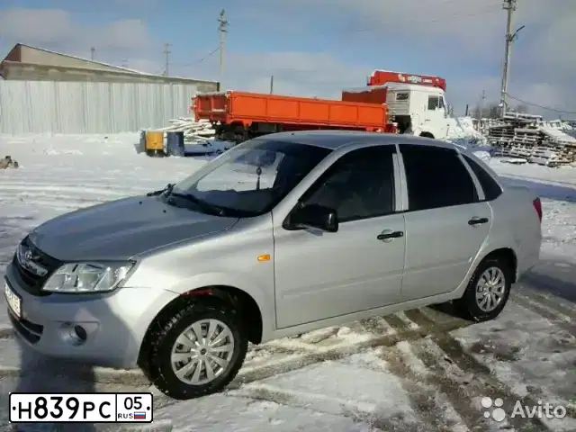Фото автомобиля LADA 2190 GRANTA, 2012 — госномер Н839РС05. Цвет: серебристый