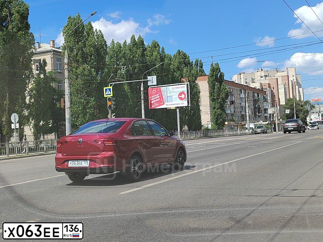 Фото автомобиля VOLKSWAGEN POLO, 2020 — госномер Х063ЕЕ136. Цвет: Красный