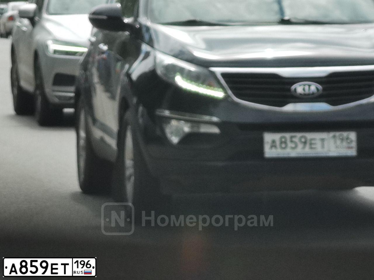 Фото автомобиля KIA SPORTAGE, 2013 — госномер А859ЕТ196. Цвет: ЧЕРНЫЙ