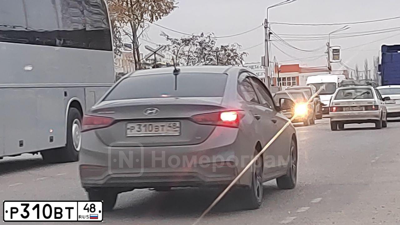 Фото автомобиля HYUNDAI SOLARIS, 2018 — госномер Р310ВТ48. Цвет: СЕРЫЙ