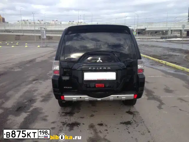 Фото автомобиля MITSUBISHI PAJERO, 2015 — госномер В875КТ198. Цвет: ЧЕРНЫЙ