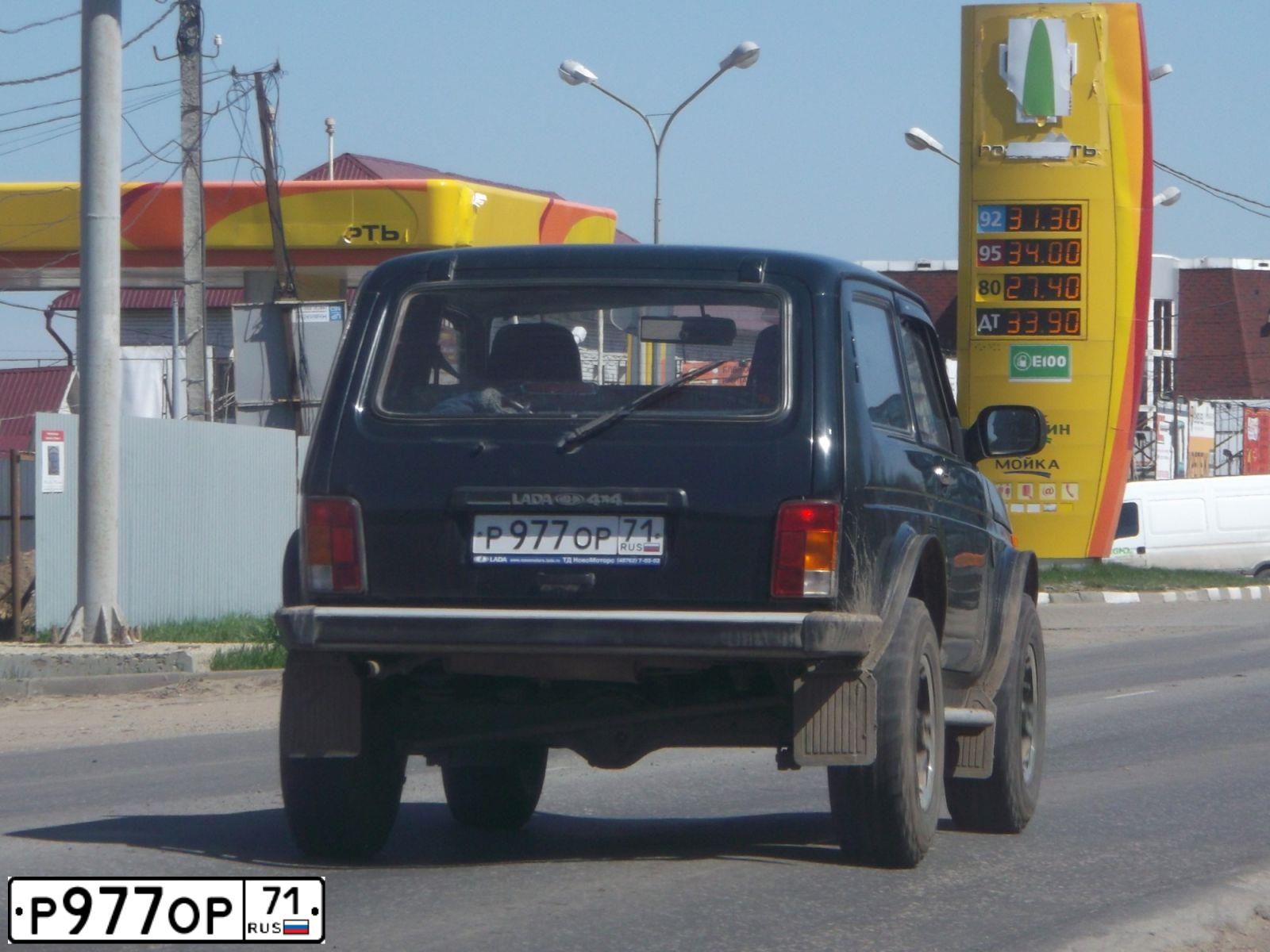 Фото автомобиля LADA 2112, 2014 — госномер Р977ОР71. Цвет: Темно-зеленый