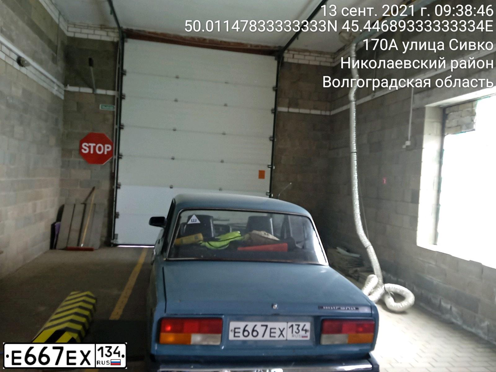 Фото автомобиля LADA 2107 LADA, 2003 — госномер Т989ХА34. Цвет: СЕРО-СИНИЙ