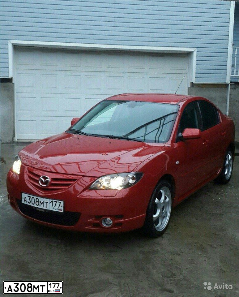 Фото автомобиля MAZDA 3, 2006 — госномер В694РВ33. Цвет: Красный