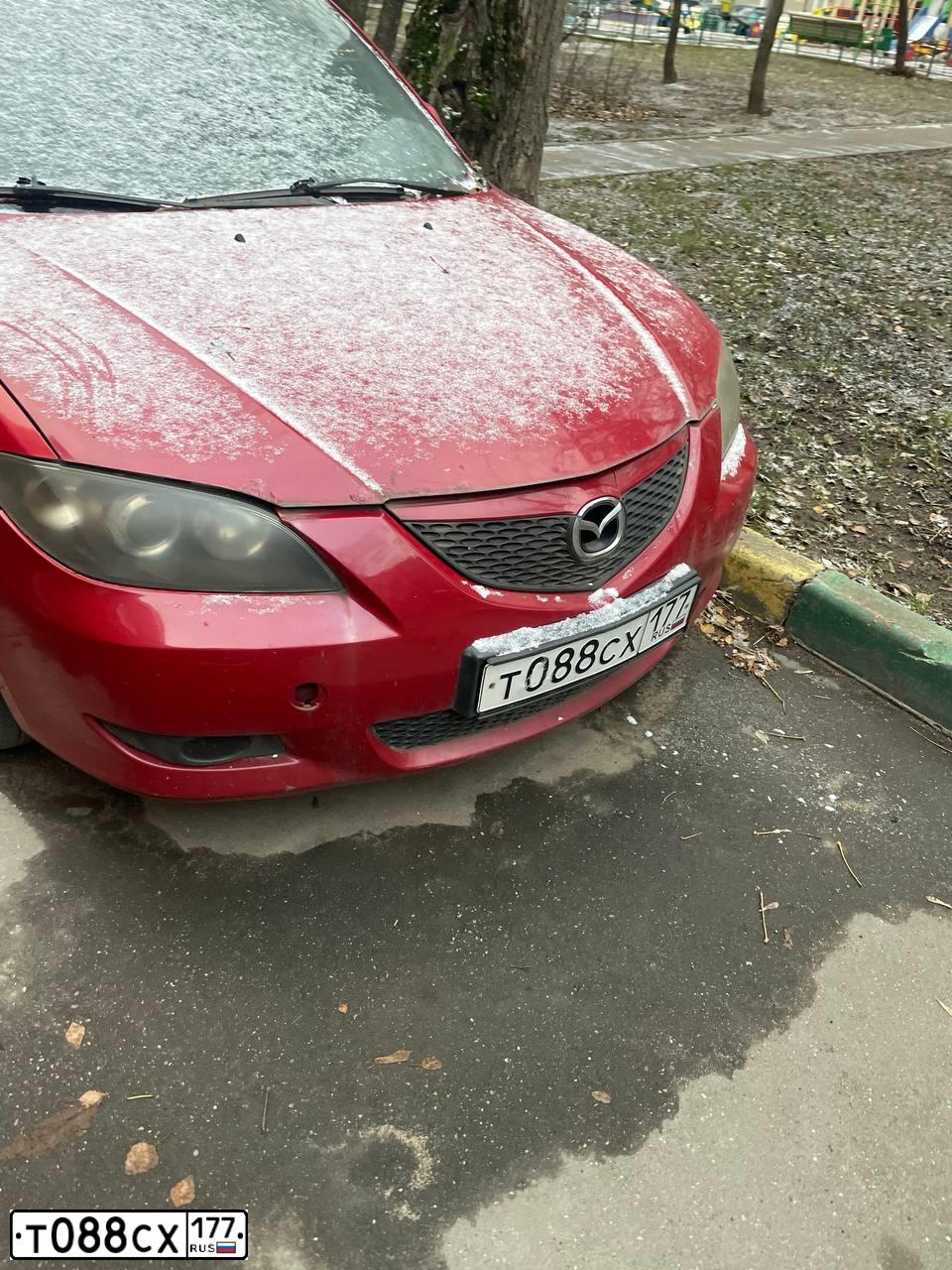 Фото автомобиля MAZDA A 3, 2005 — госномер Т088СХ177. Цвет: Красный