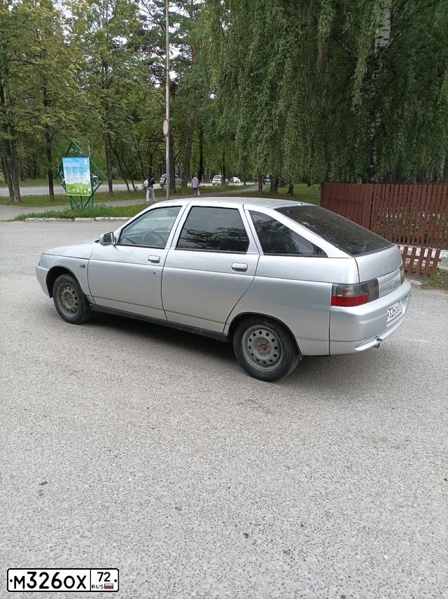 Фото автомобиля LADA 2112, 2006 — госномер М326ОХ72. Цвет: СВЕТЛО-СЕРЕБРИСТЫЙ МЕТАЛЛ