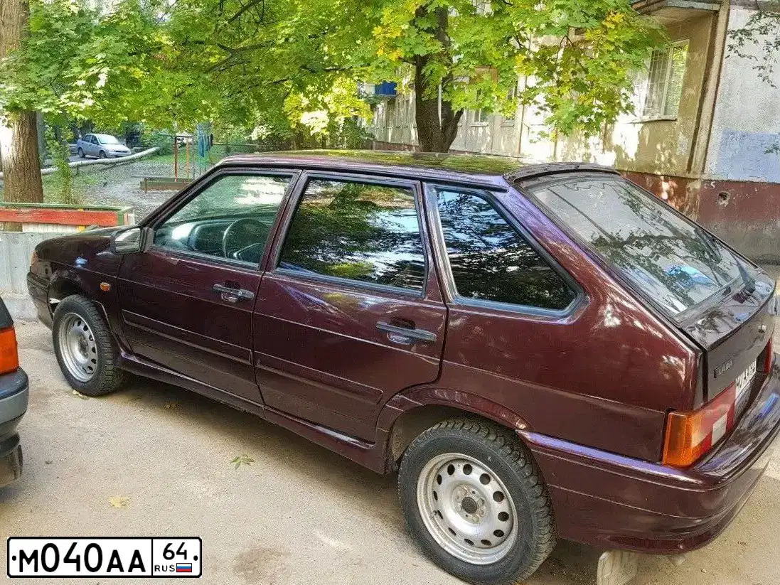 Фото автомобиля LADA 2114 SAMARA, 2012 — госномер Е752НВ164. Цвет: ТЕМНО ВИШНЕВЫЙ