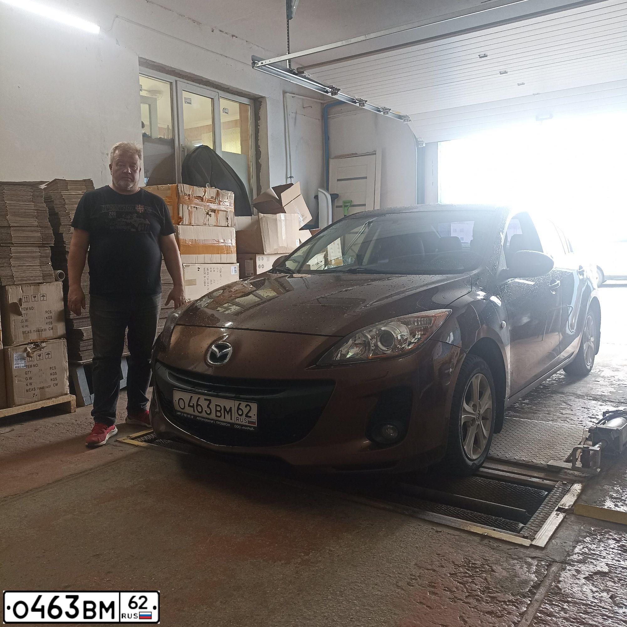 Фото автомобиля MAZDA 3, 2011 — госномер В534УЕ62. Цвет: Коричневый