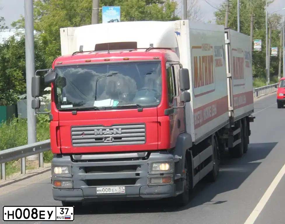Фото автомобиля MAN TGA 26.350, 2010 — госномер Т308ОР58. Цвет: КРАСНО-БЕЛЫЙ